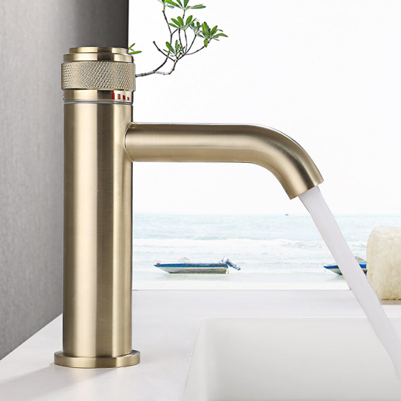 Single-handle bathroom mixer faucet installed in a bathroom setting - brass construction
