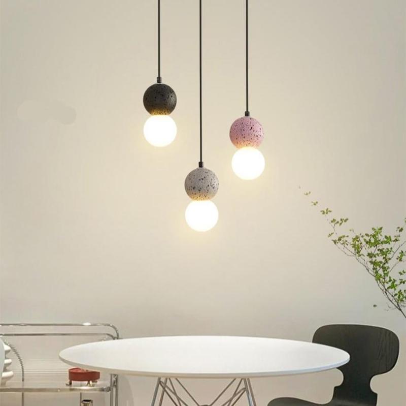 Glass LED pendant light with sleek modern silhouette