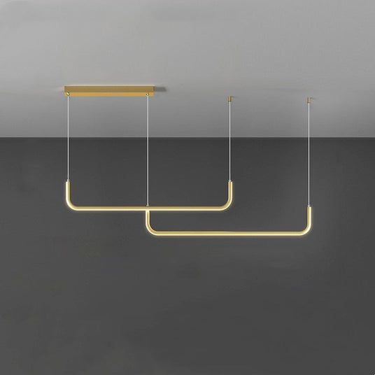 Metal and silicone pendant light with LED source