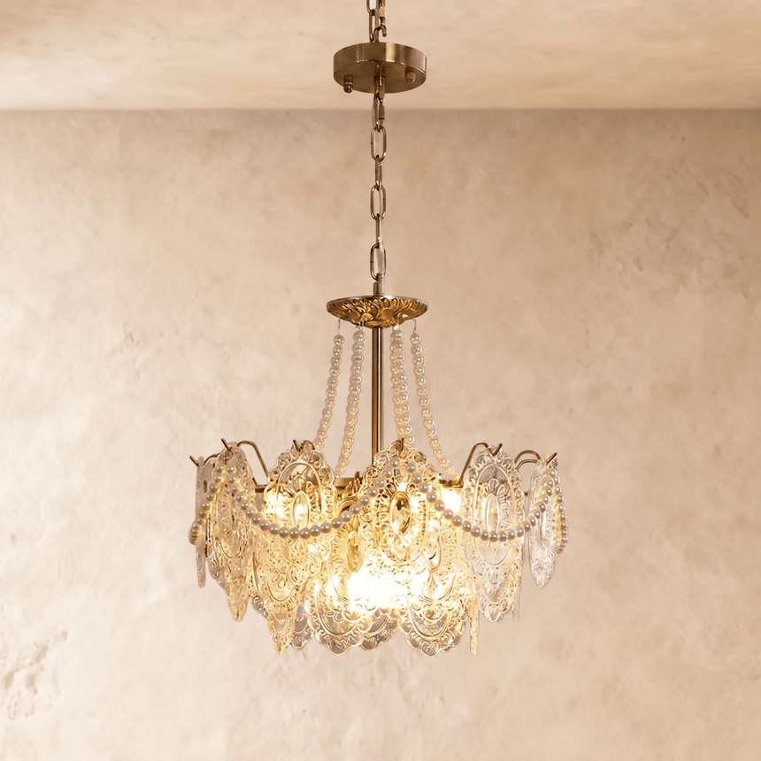 Style A at mid size, three tiers of pressed glass lit from inside the brass frame