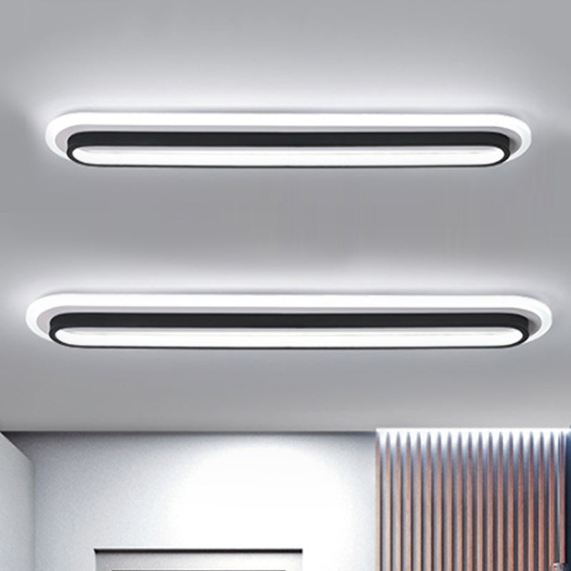 Oval Ceiling Light Installed Above Bedroom