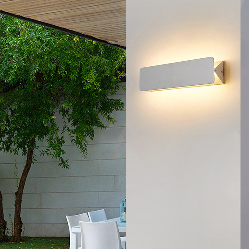 Acrylic Wall Lamp Mounted in Bedroom Setting