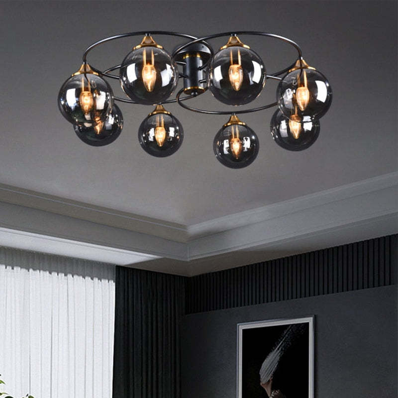 Smoked Glass Chandelier Installed Above Dining Table