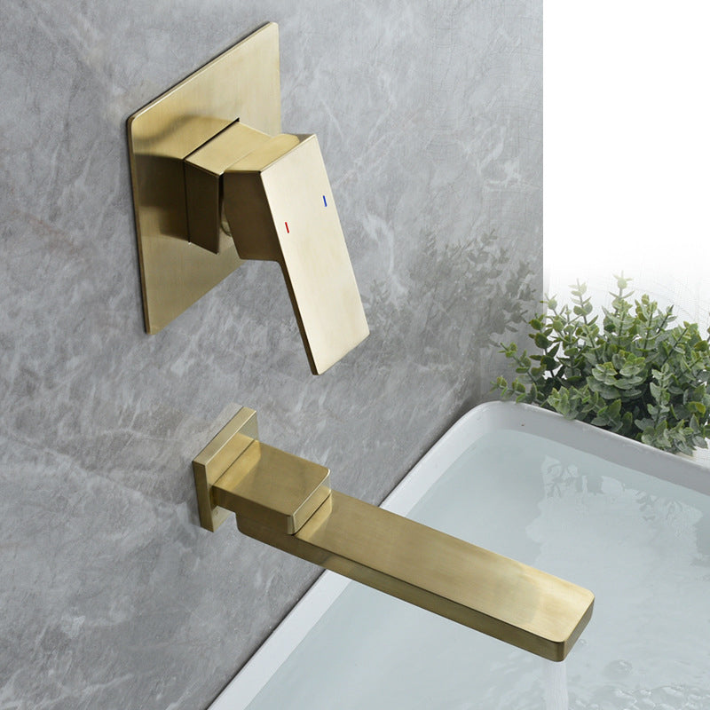 Wall mounted bathroom faucet close-up view - brushed gold finish