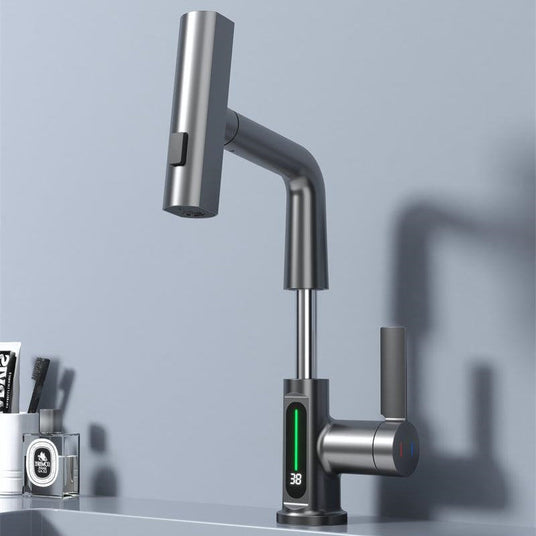 Brass kitchen faucet close-up view - digital temperature display