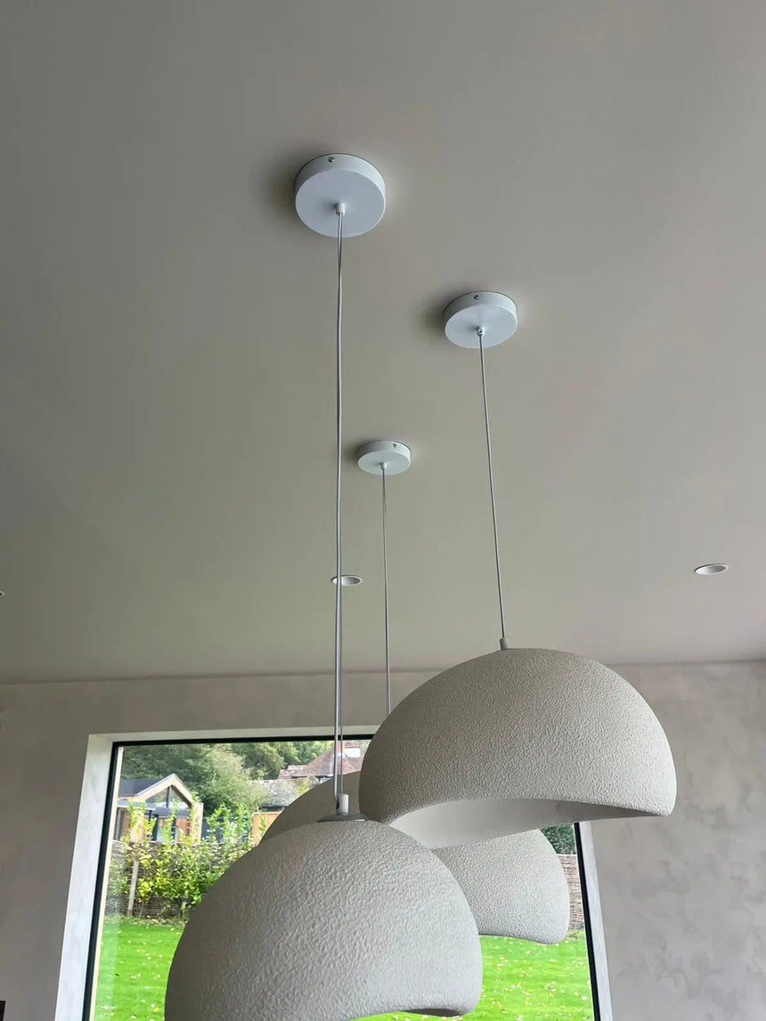 Chandelier fixture in contemporary bedroom