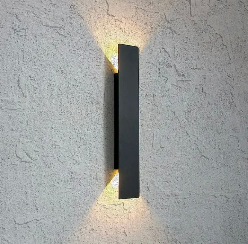 Wall light mounted near a front door