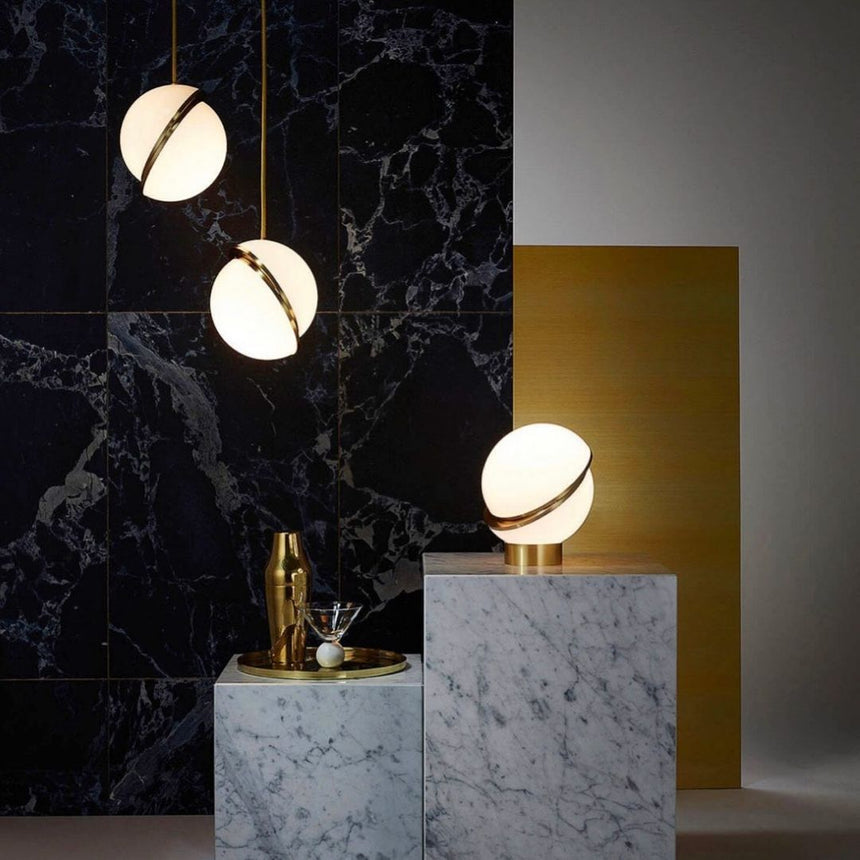 Moon-Shaped Pendant Light Installed in Living Room