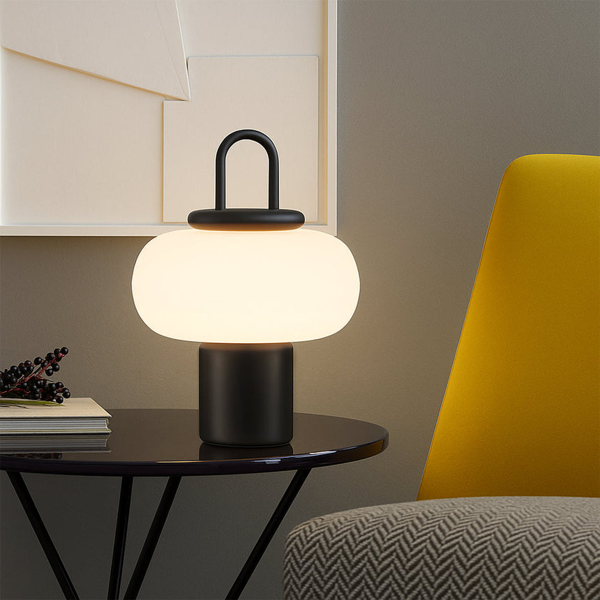 Glass and metal table lamp for reading nook