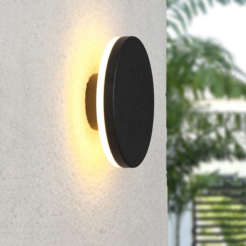 Exterior wall lamp mounted near a door