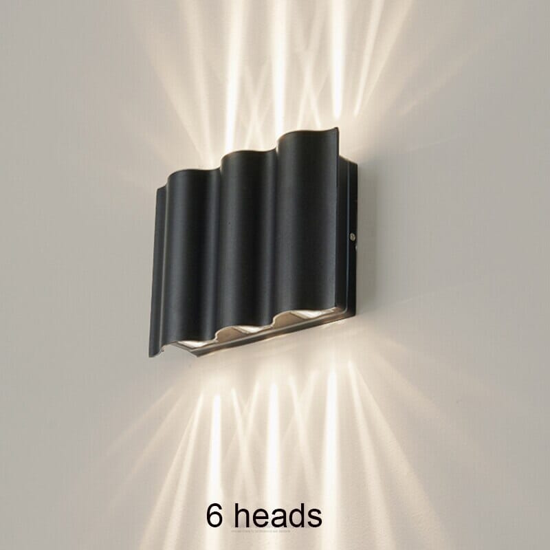Garden accent light mounted on exterior wall