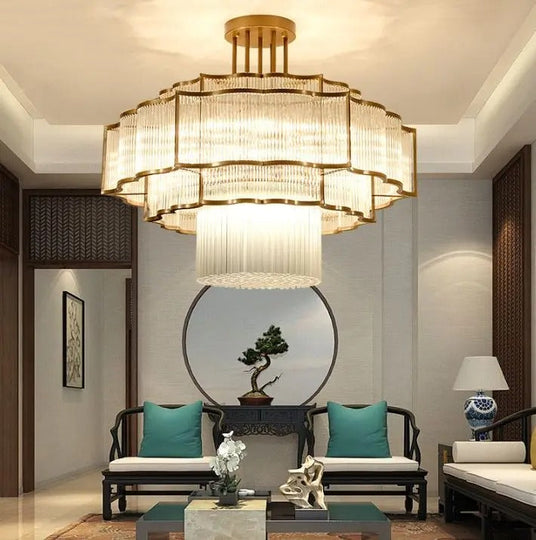 Multi-layered crystal pendant light with metal frame