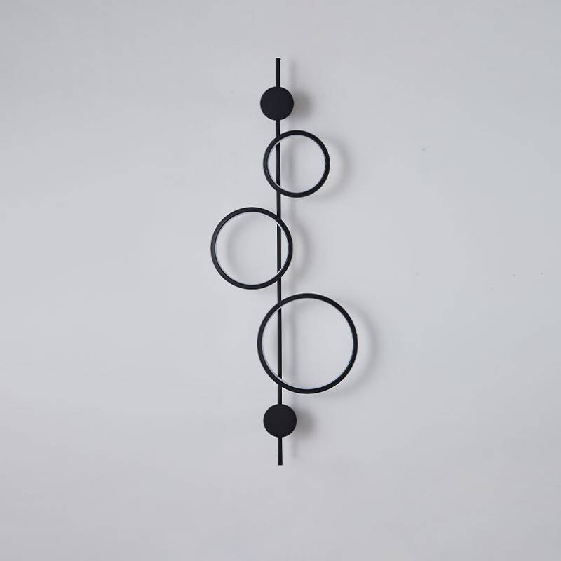 Wall lamp mounted in bedroom setting