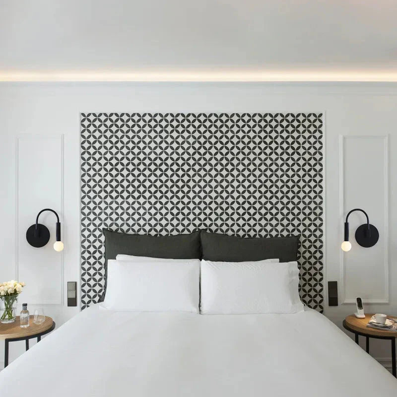 Wall mounted metal light with downward shade