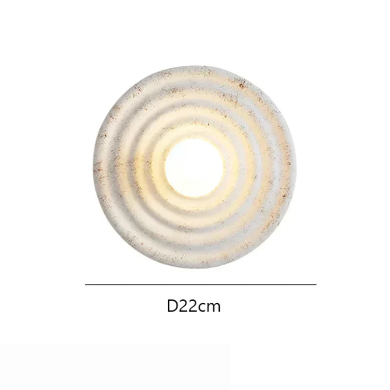 Durable resin and iron wall light fixture