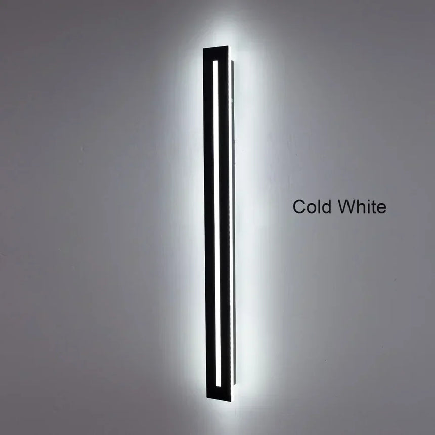 Chrome wall lamp shown above a table