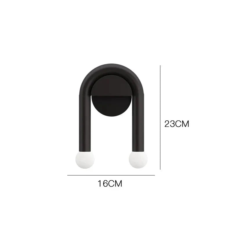 Entryway wall light with downward beam
