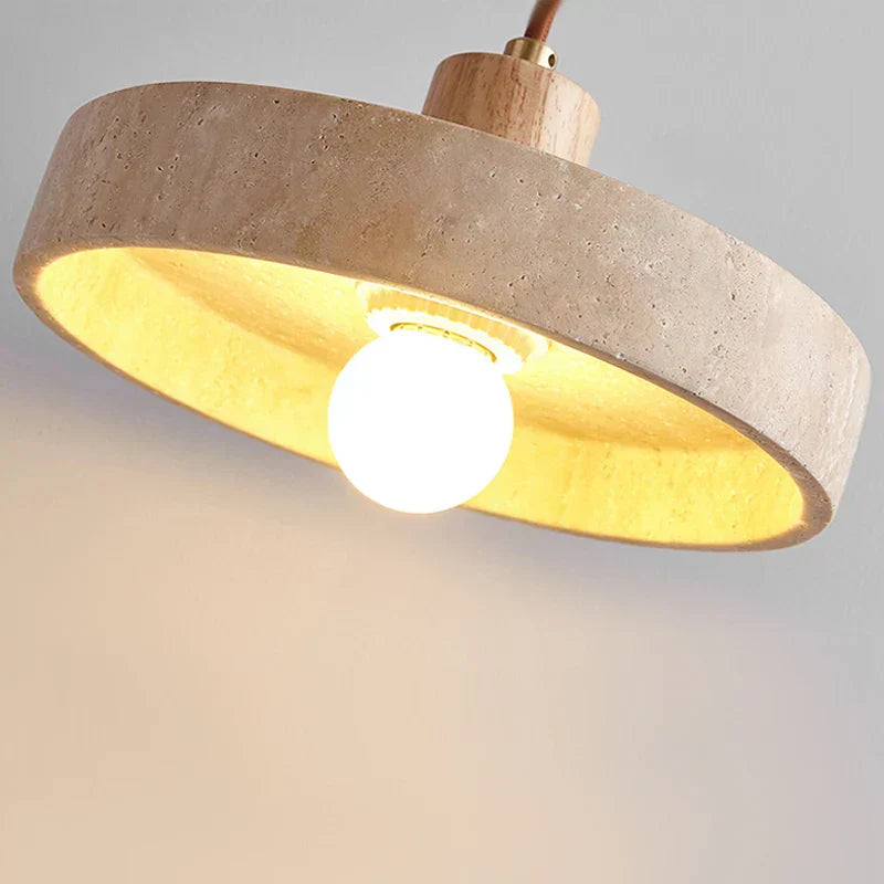 Travertine pendant light side angle detail view