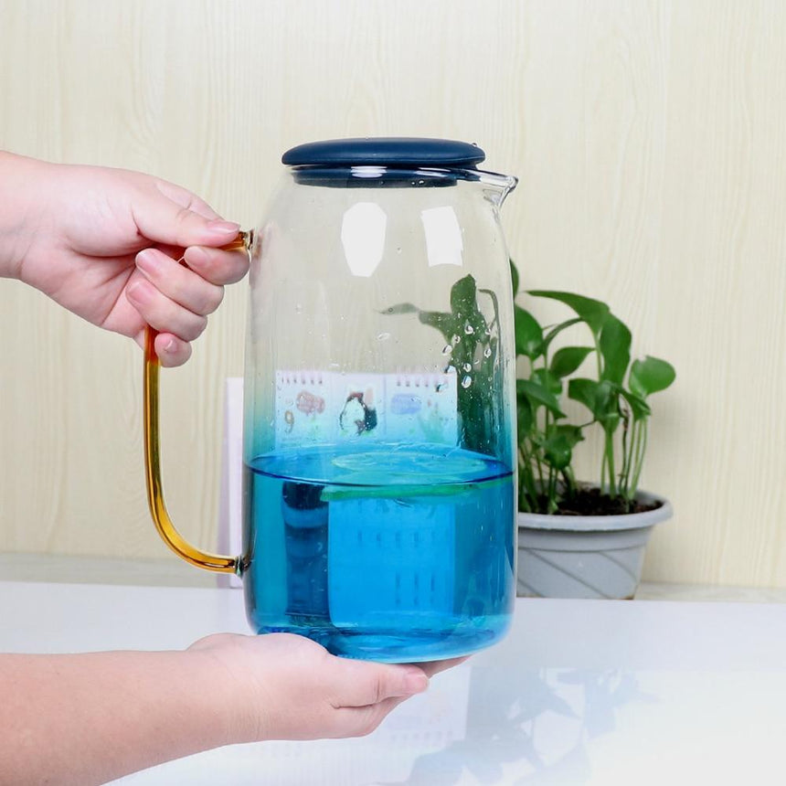 Glass pitcher set installed on table