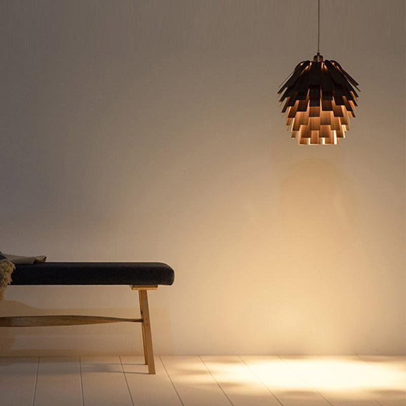 Sculptural wood pendant light close-up detail