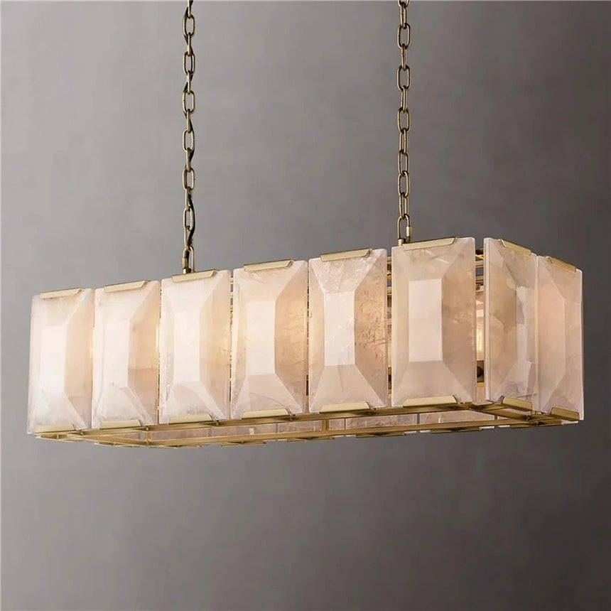 A lit rectangular stone cage in a black frame seen at an angle