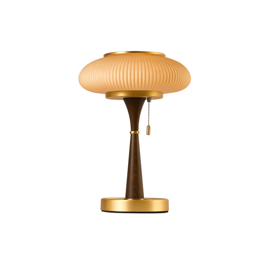The amber glass version of the lamp seen front on, plain ground