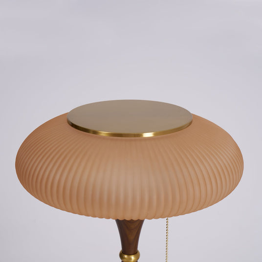 Close view of the vertical ribs pressed into the glass cap