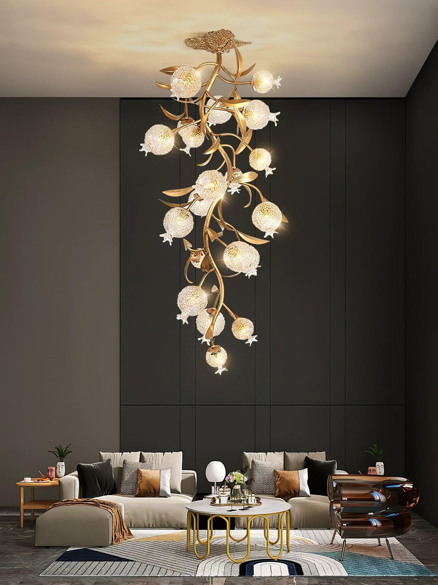 Brass branch chandelier above a seating area in a dark living room