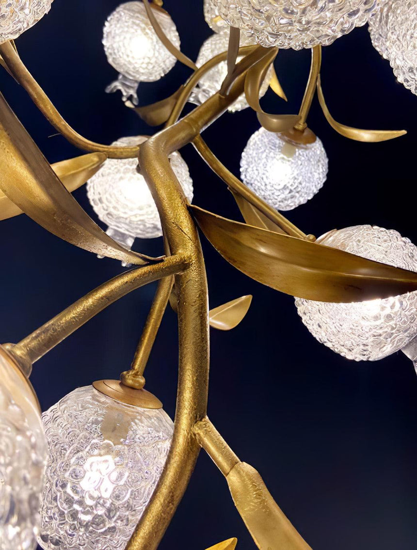 Close view of the brass branches where the stems meet