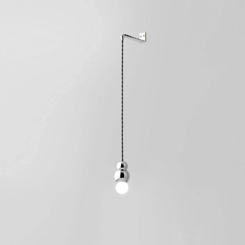 The chrome finish on a pale background