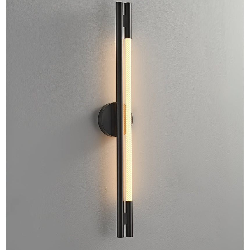 The lit strip seen close on a gray wall, the black frame in shadow