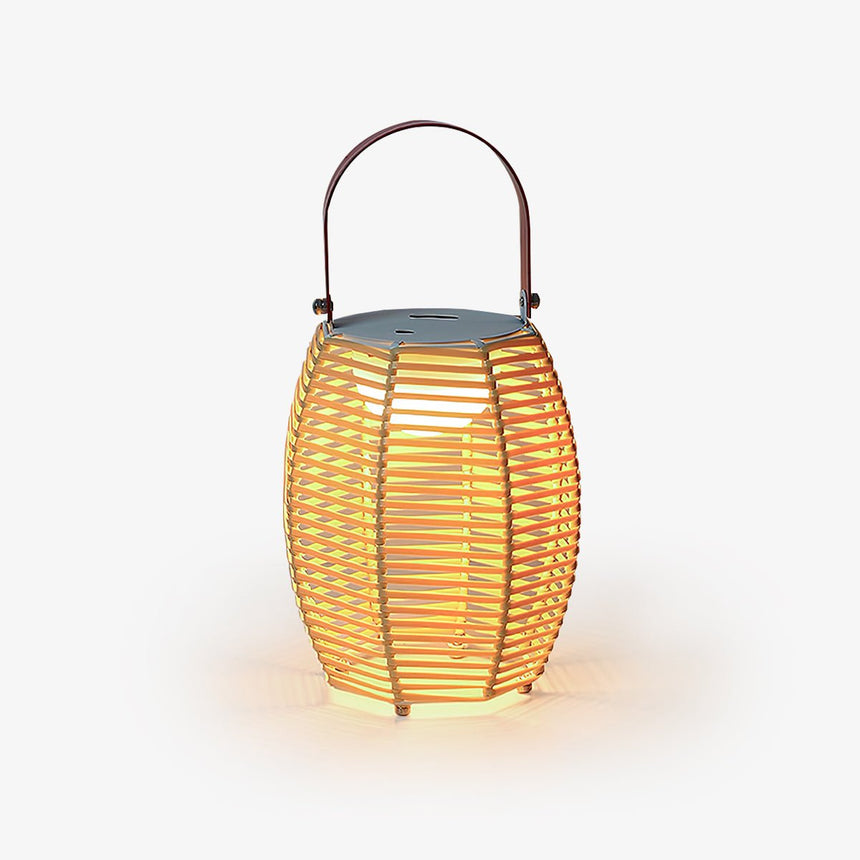 Ribbed lantern in a warm yellow tone with a dark arched carry handle