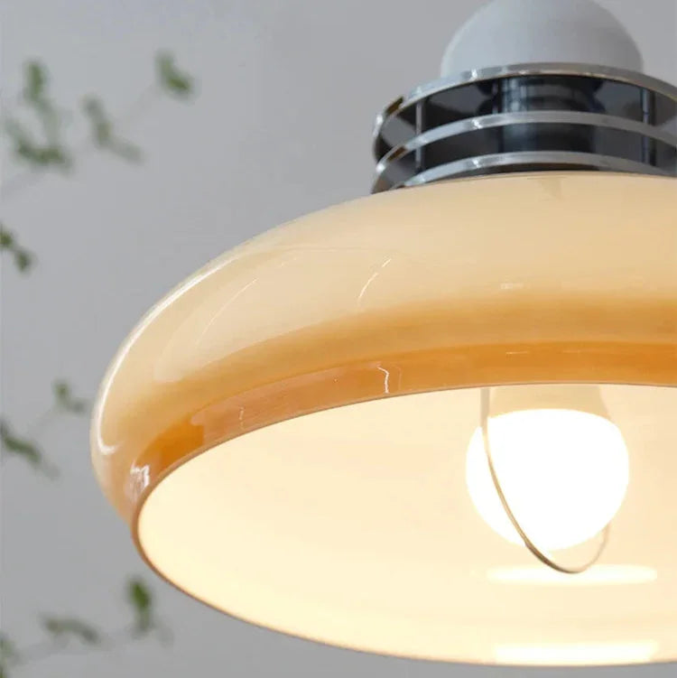 Close view of the lit underside of the shade showing the bulb inside