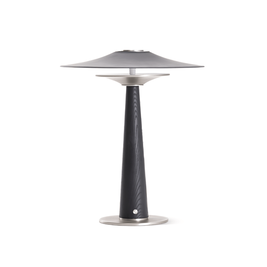 Bedroom table lamp seen in full height against a plain ground
