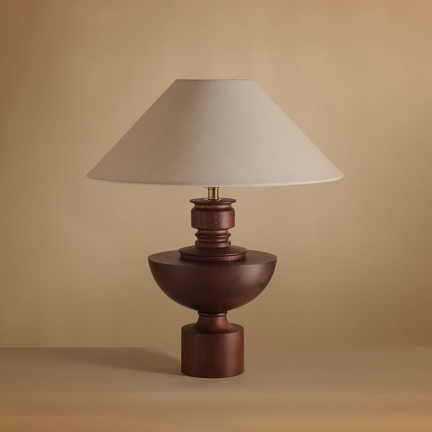 Close view of the turned walnut vase base and the brass collar