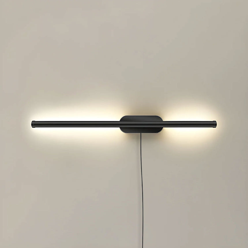 The slim black profile seen unlit, a thin bar through a small round plate