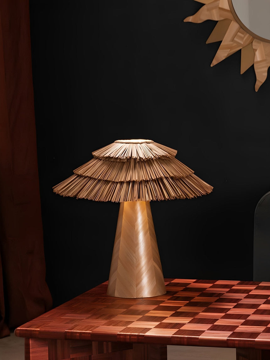 Two boho table lamps of different sizes on a checkered table
