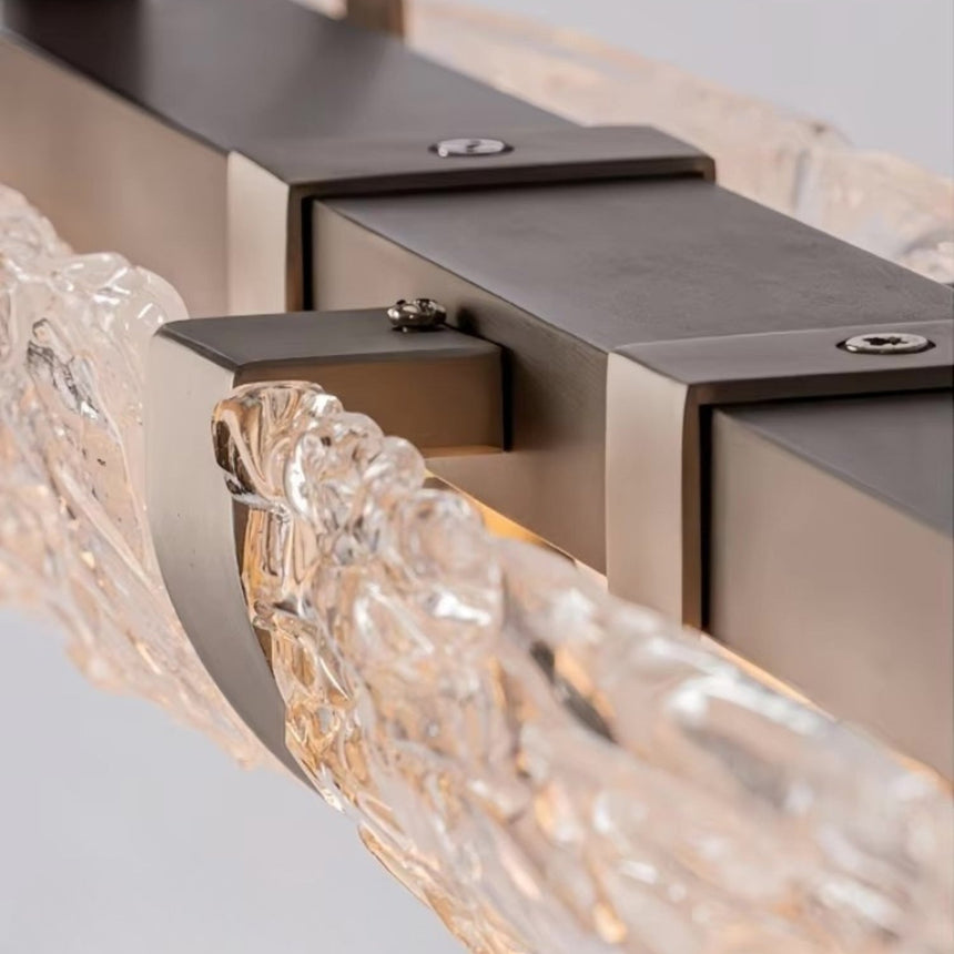 Close view of the rough textured glass catching light along the bar
