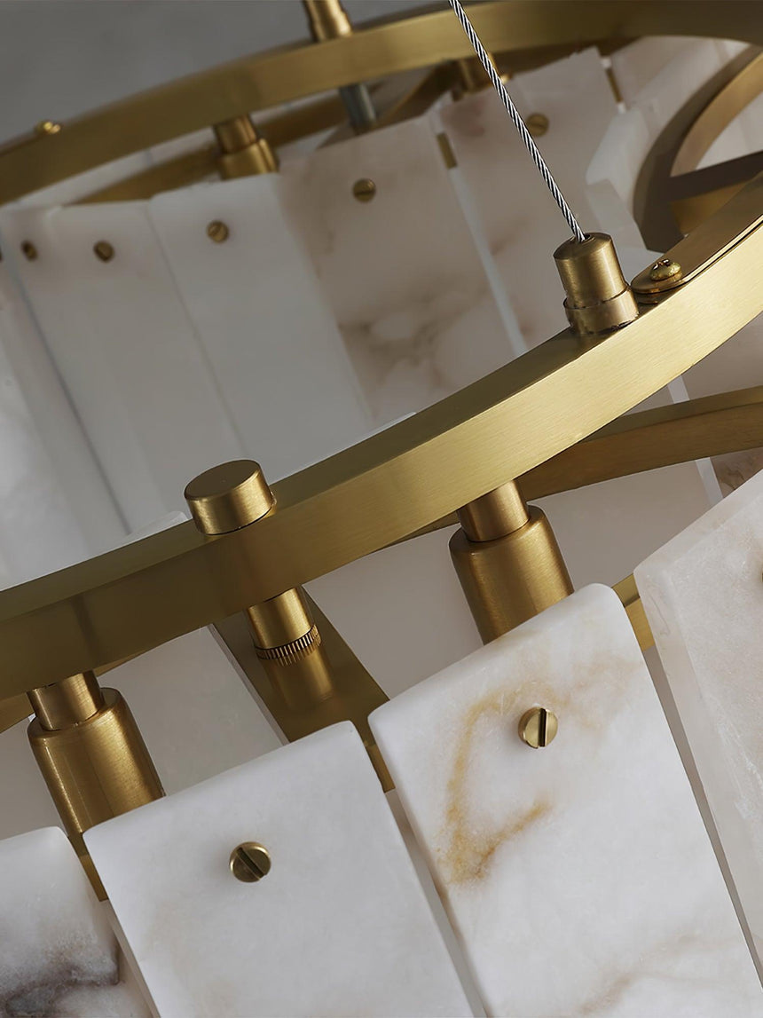 Close view of the brass frame and the fasteners that hold each panel