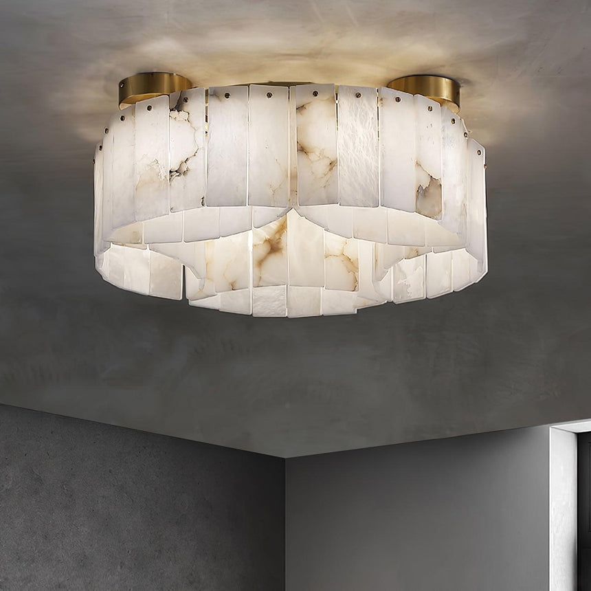 Alabaster panel ceiling light in a corner of a dark plaster room