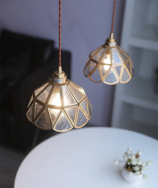 Pendant light with twisted fabric cord detail