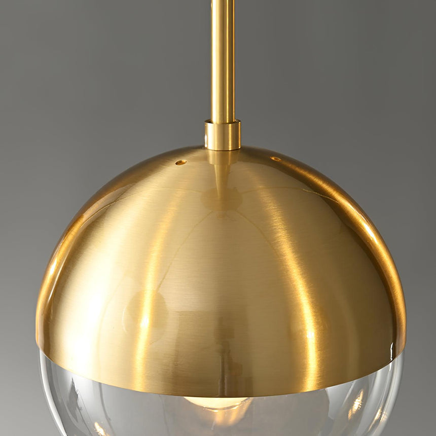 Close view of one globe showing the plated upper half and clear lower half