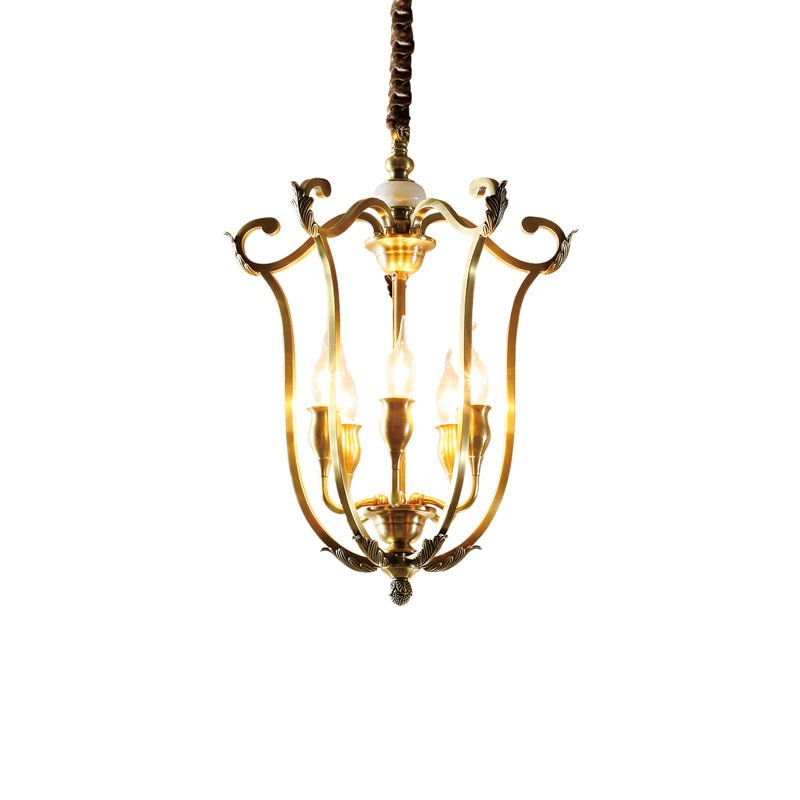 The scroll frame lit, showing the curled finials at the top of each upright