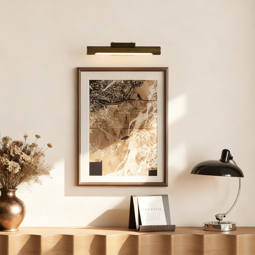 Wall sconce with a brass shade