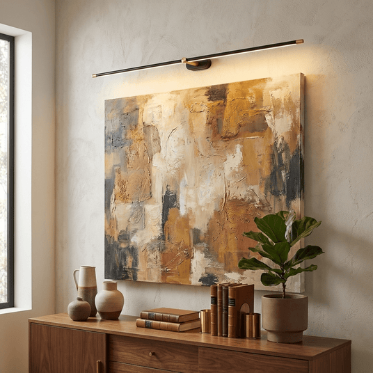 Slim rod lit above a large abstract canvas over a walnut sideboard with pots