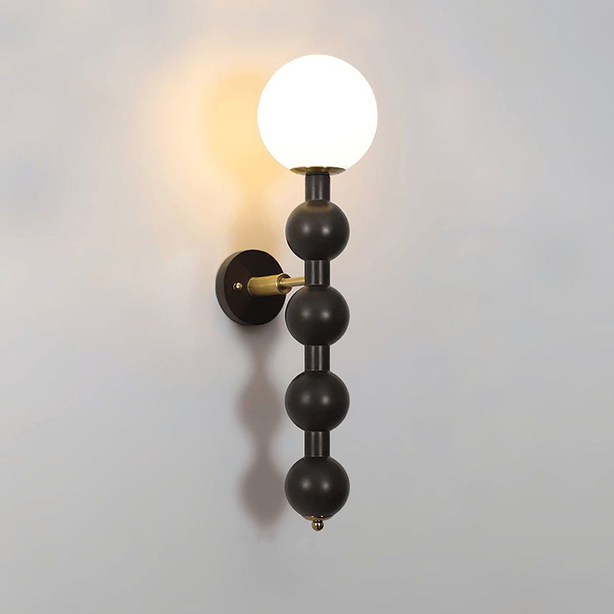 The black bead column seen from the front with the globe lit above