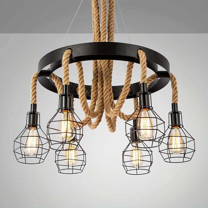 The rope swags and their cages lit, the ring dark above them