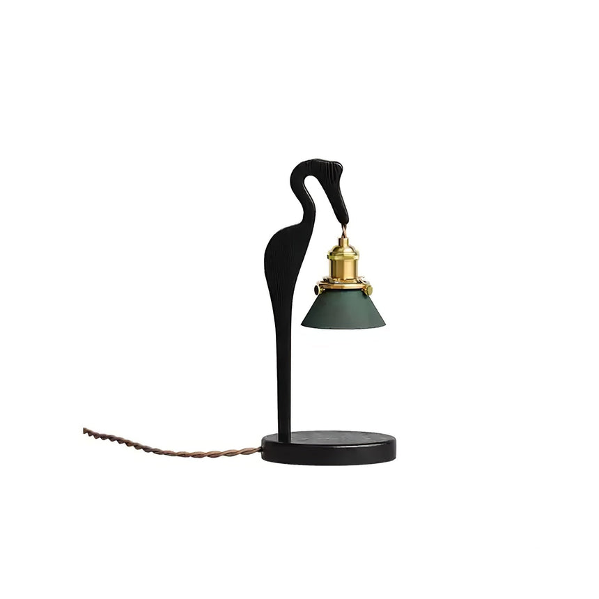 Black heron candle warmer lamp on a plain ground with a twisted cord