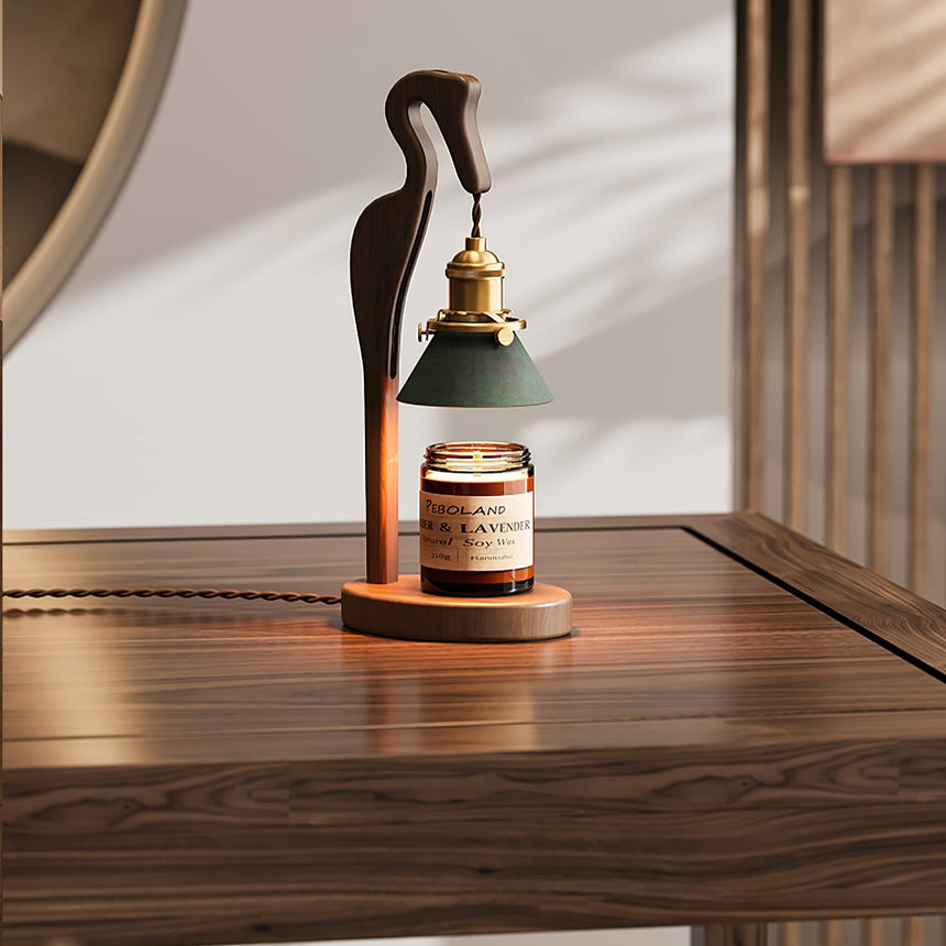 Heron lamp lit on a wood cabinet beside a round mirror
