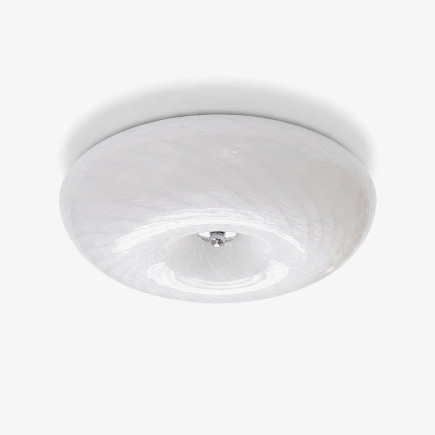 Swirled glass flush mount ceiling light with a chrome center cap